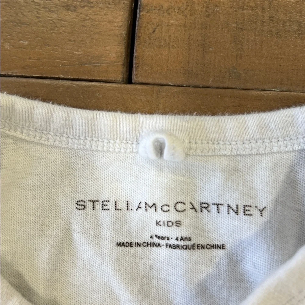 Stella McCartney Kids White Long Sleeve logo Tee with Colorful Tassels 4 years